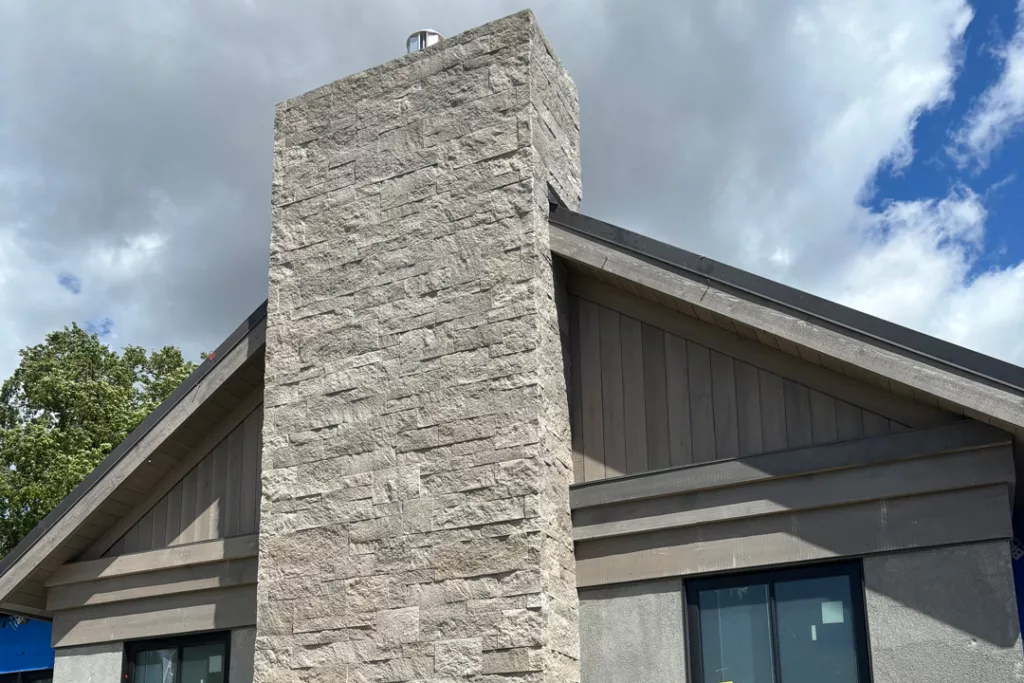 newly constructed stone veneer chimney for trubody lane home in napa